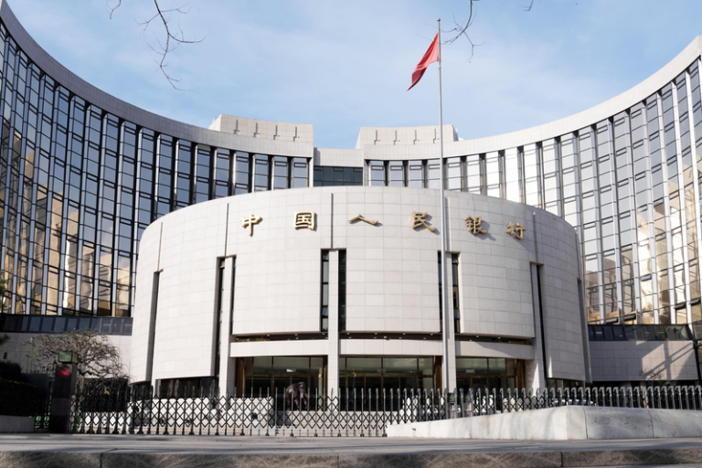 近期中国金融圈热议，中国人民银行可能在7月重启国债买卖操作。（中新社）
