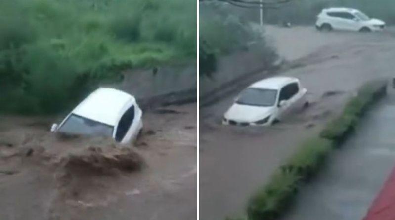 山西暴雨引发洪灾,传出多辆汽车被冲走(见图),其中一辆载有12人的中巴失联。(视频截屏)