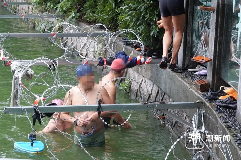 杭州贴沙河为了避免民众下水游泳，在岸边设置铁丝网。（取材自潮新闻）