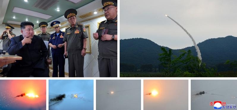 北韩官媒中央通信社(KCNA)于当地时间24日释出,飞弹试射照片。北韩领导人金正恩(左上图前左)亲自视察。(路透)
