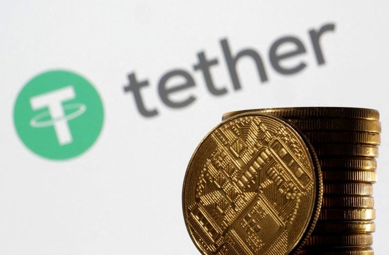 USDT稳定币发行商Tether传出洽谈投资黄金开采产业。(路透)