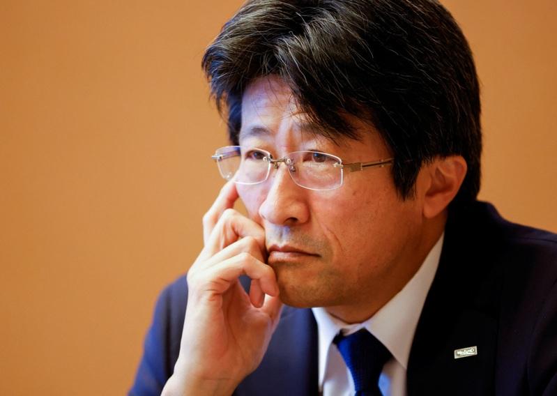 日本瑞穗金融集团宣布,未来10年内将引进AI取代约5,000个行政职位。(路透)