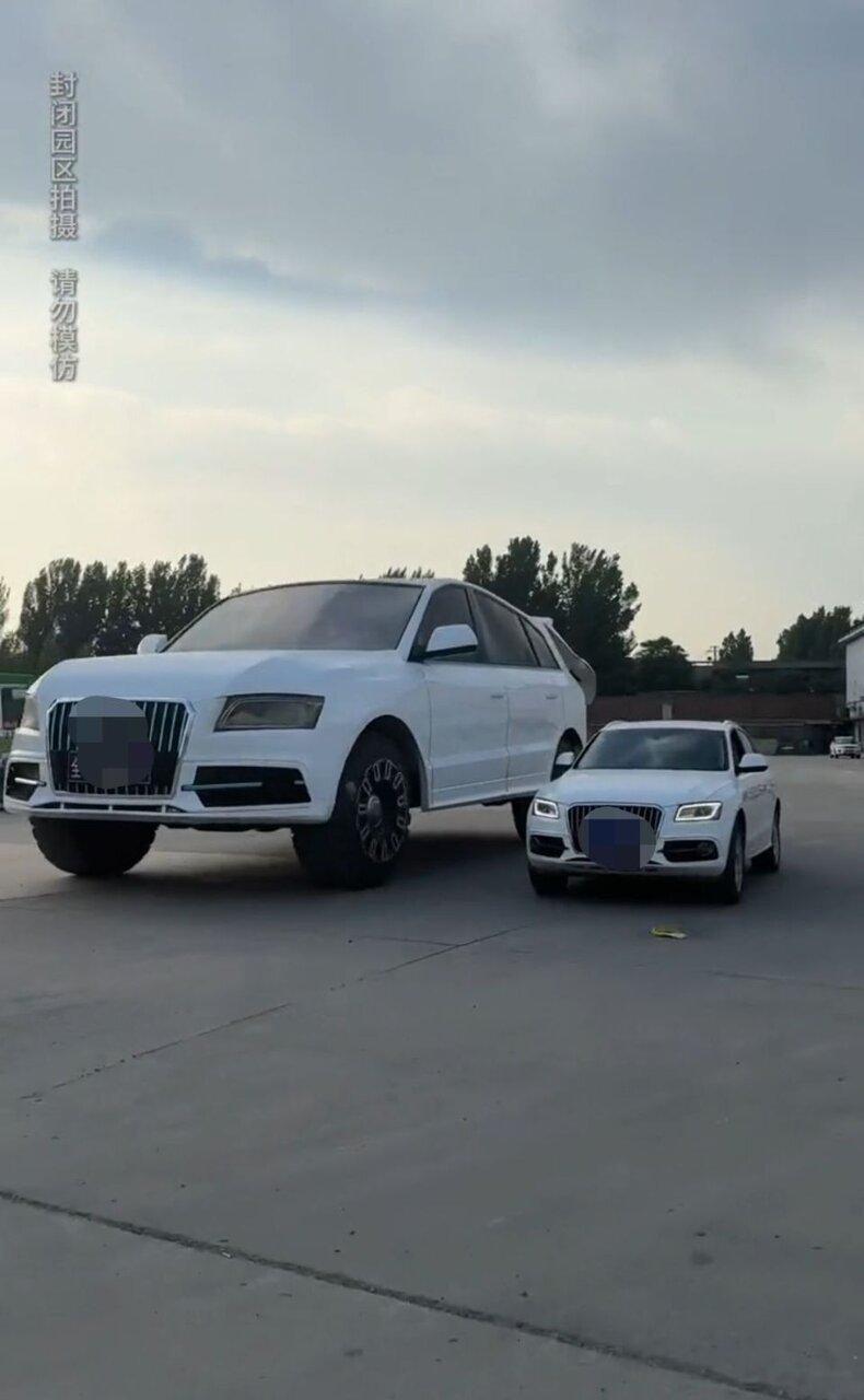 王先生制造的巨型SUV与正常车型大小差距明显。（视频截屏）