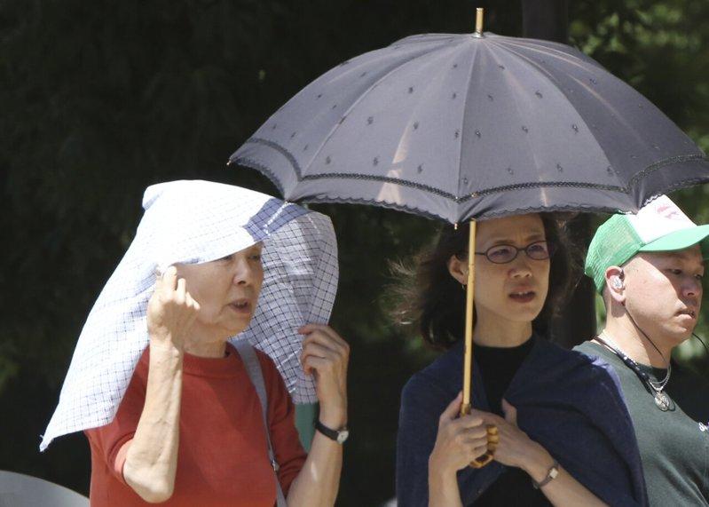 亚洲今夏气温预料将高于往年正常水准。(美联社)