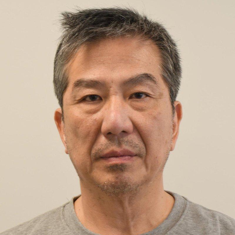 66岁退休港警、前香港驻伦敦经济贸易办事处行政经理袁松彪(Chung Biu
