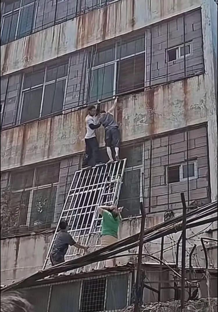 攀岩好手王先生救缓。(取材自潇湘晨报)