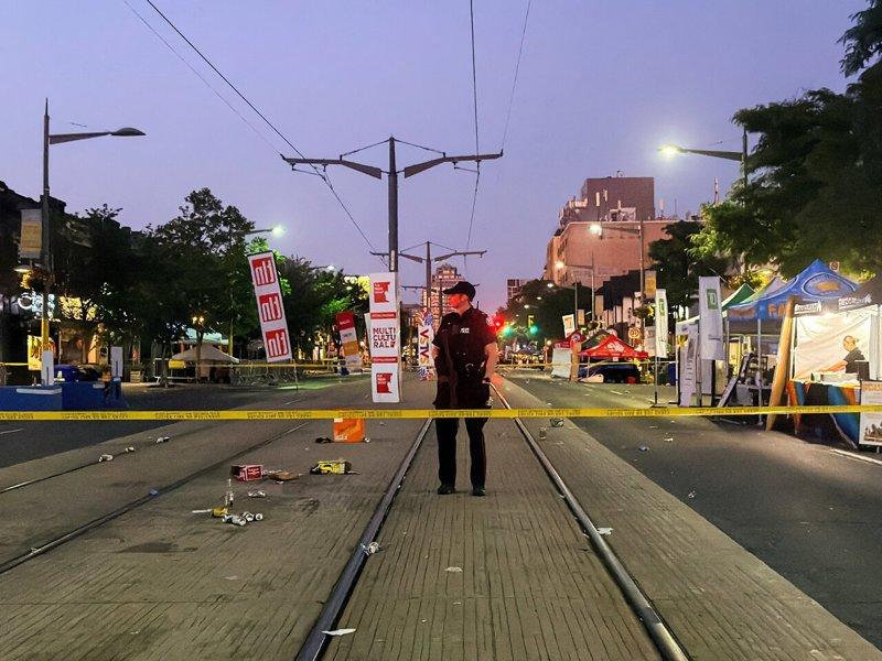 多伦多7月11日节庆活动发生致命枪案,警方现场戒备。(路透)