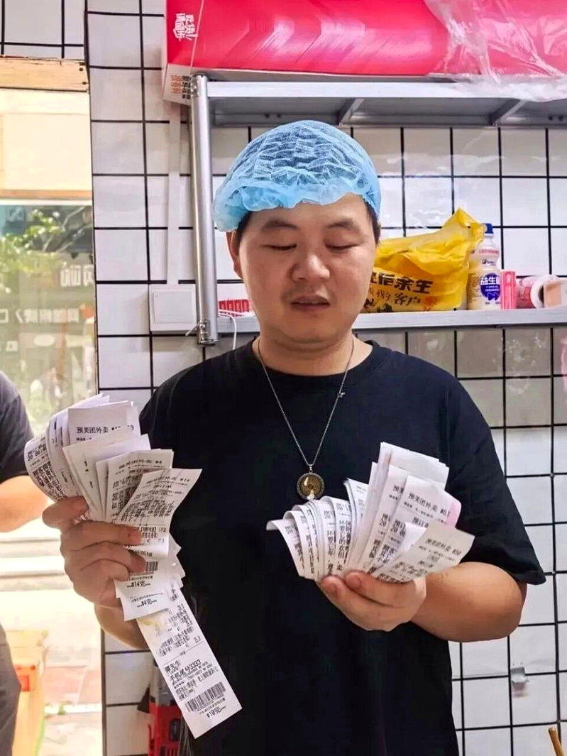 早餐店近期爱心订单爆单。（取材自光明日报）