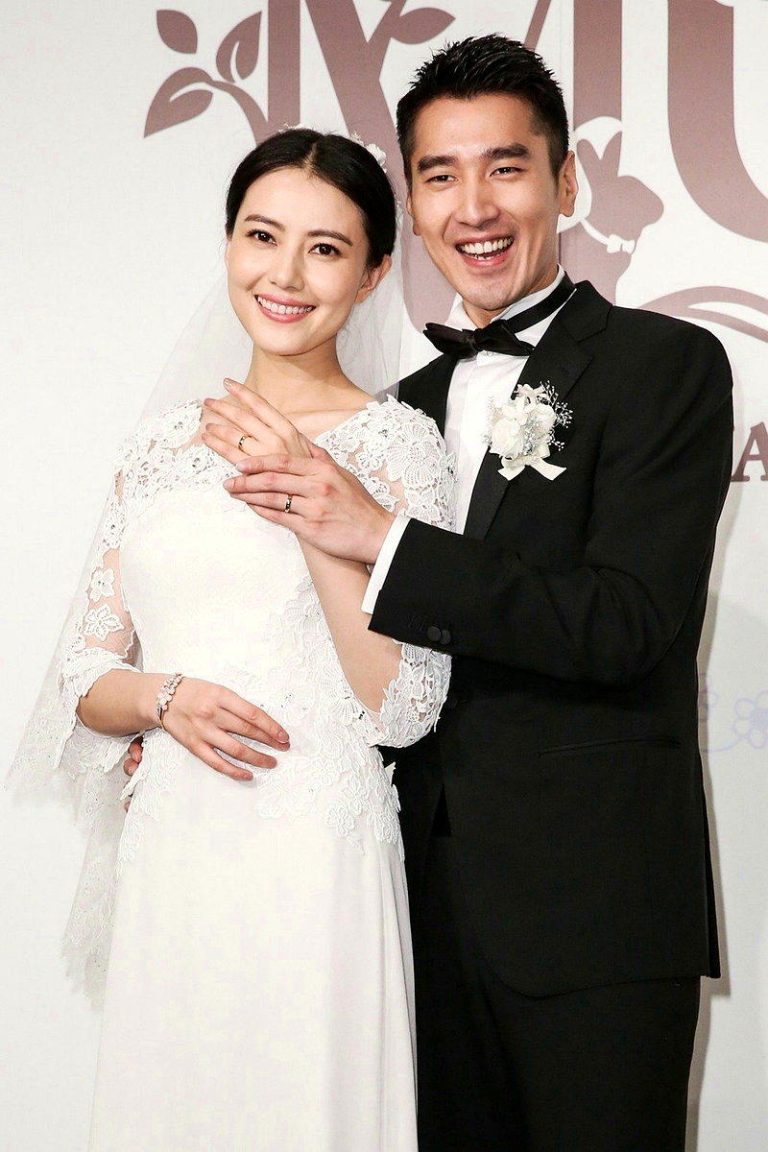赵又廷(右)和高圆圆2014年结婚。(联合报系数据照)