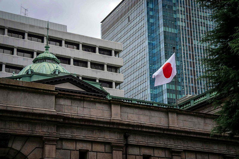 日银宣布将政策利率上调1码至1.25%。法新社