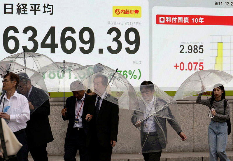 最新数据显示,日本家庭持有的股票资产规模首度超越保险与退休金资产。(欧新社)